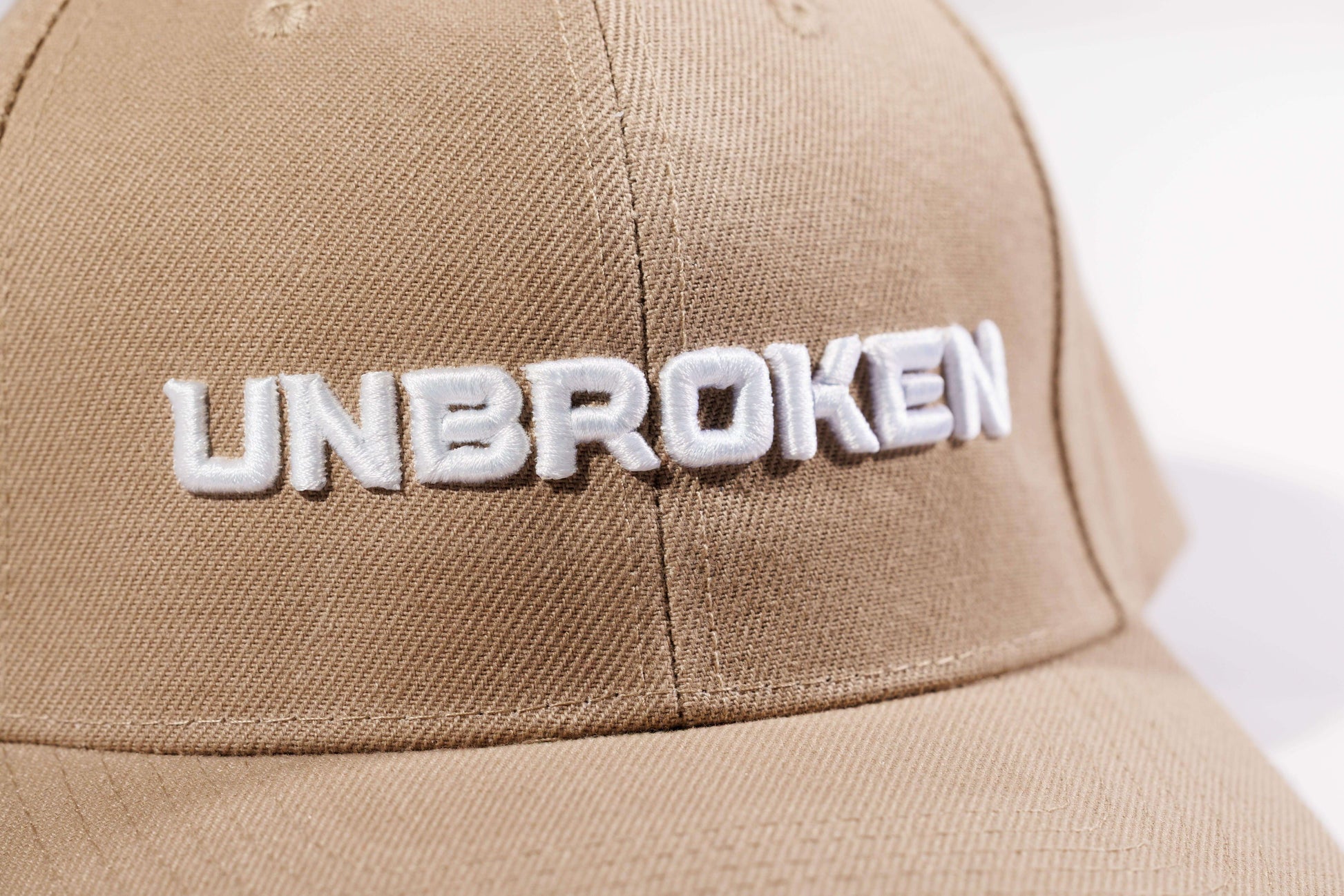 BEIGE CAP: UNBROKEN - Unbroken